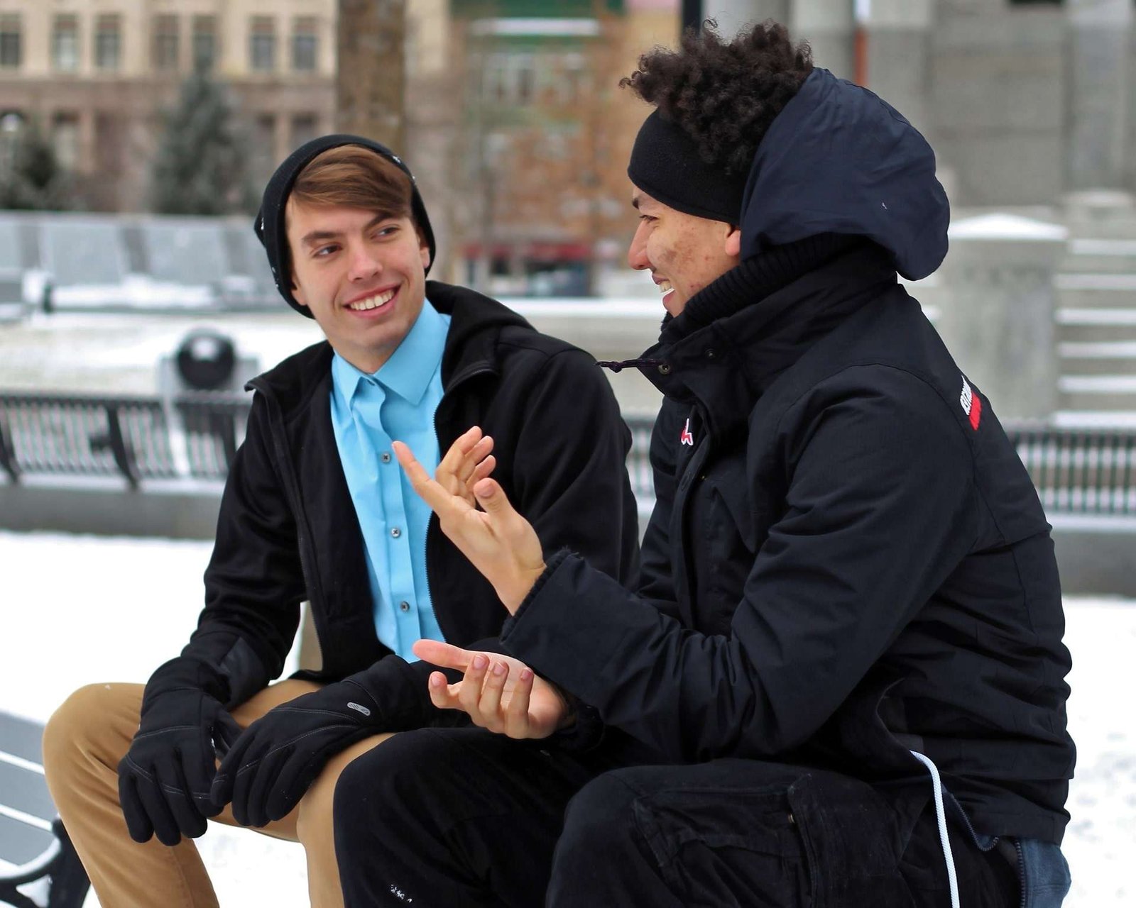two people talking and actively listening
