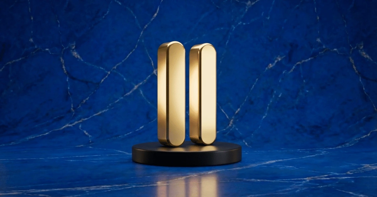 A golden pause button showing how to unwind after work.