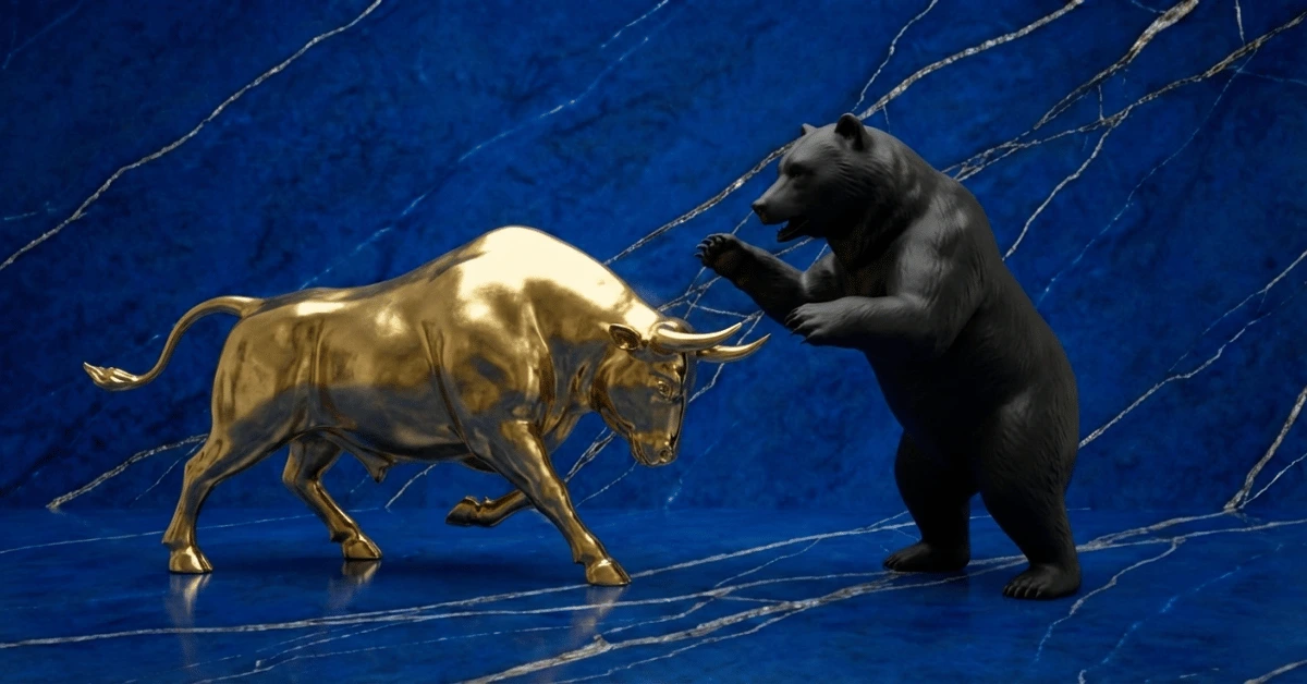 Golden statue of a bull and black statue of a bear representing a bull market and bear market.