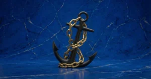 A black anchor with golden chains to represent how to make good habits stick.
