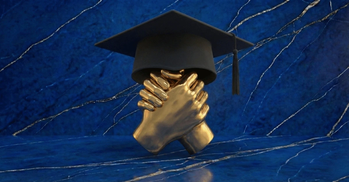 Making friends in college as an introvert represented by two hands shaking with a graduation hat above.