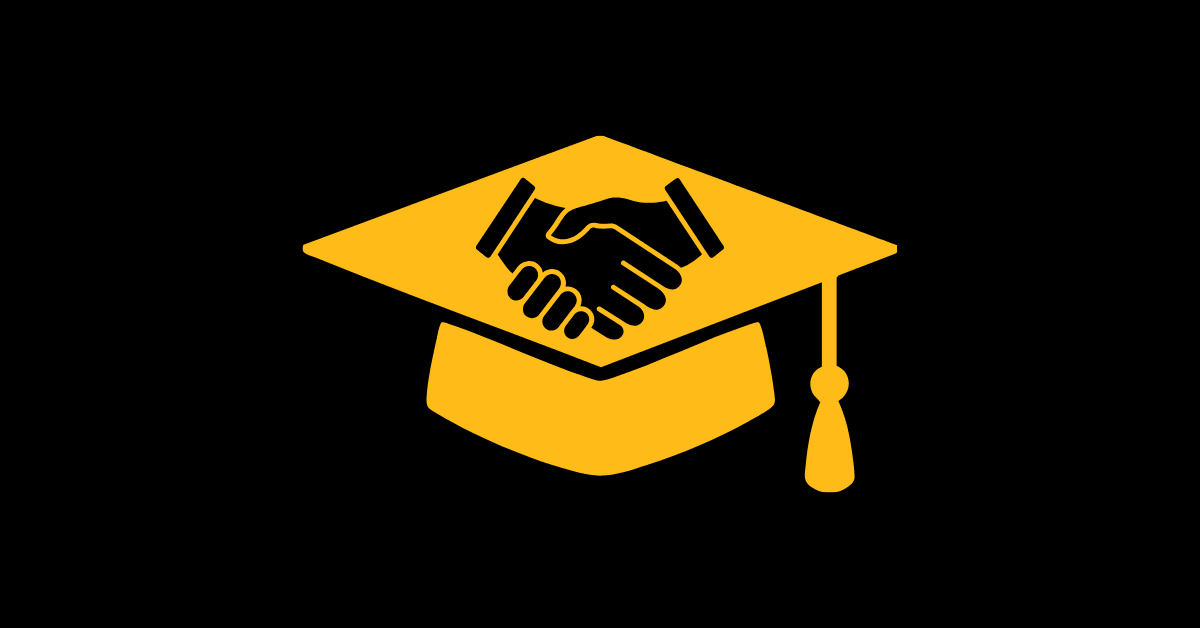 Making friends in college as an introvert represented by two hands shaking within a graduation hat.