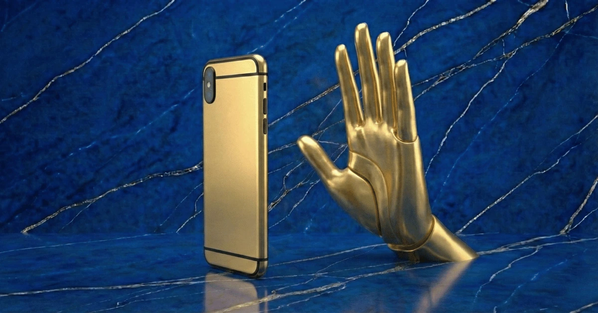 A golden phone with a golden hand refusing to grab the phone representing stopping phubbing.