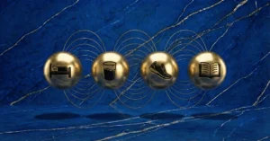 Habit stacking symbolized through four golden spheres with symbols for different stacked habits.