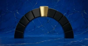 A black arch with a golden keystone symbolizing keystone habits.